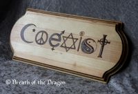 long plaque using various religious symbols to spell out 'coexist'