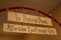 hanging sign for 'The Natural Nook - Affordable Eco-Friendly Gifts'
