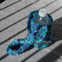 blue and green colored bottle carrier with long strap, crochet by Sunfire